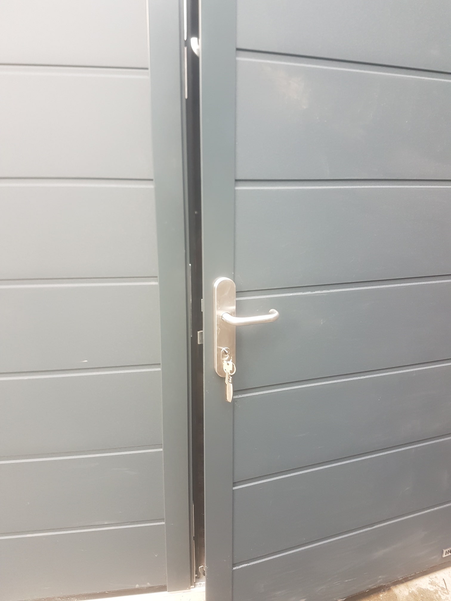 Insulated side hinged garage doors 4